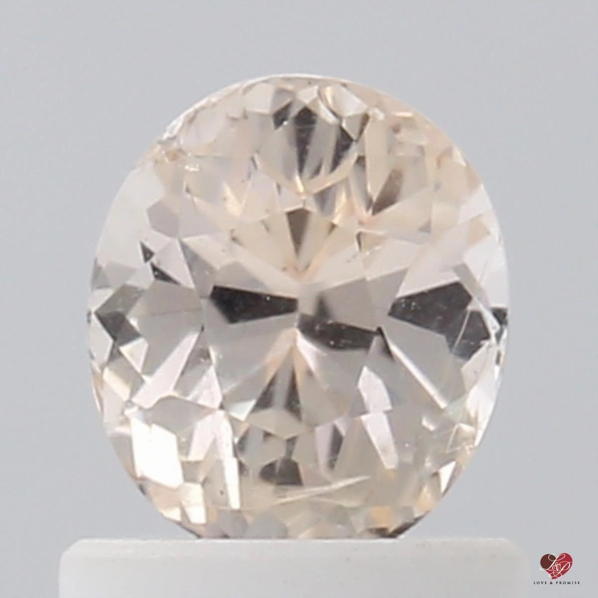 1.08cts Oval Light Peach Champagne Blush Sapphire