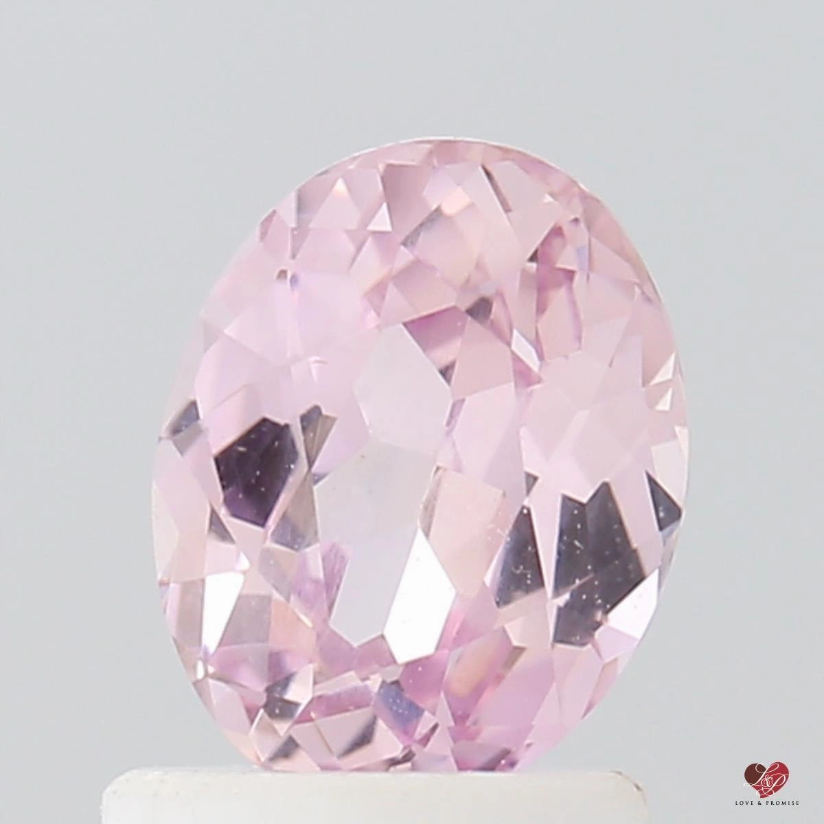 1.35cts Oval Medium Peach Blush Champagne Sapphire