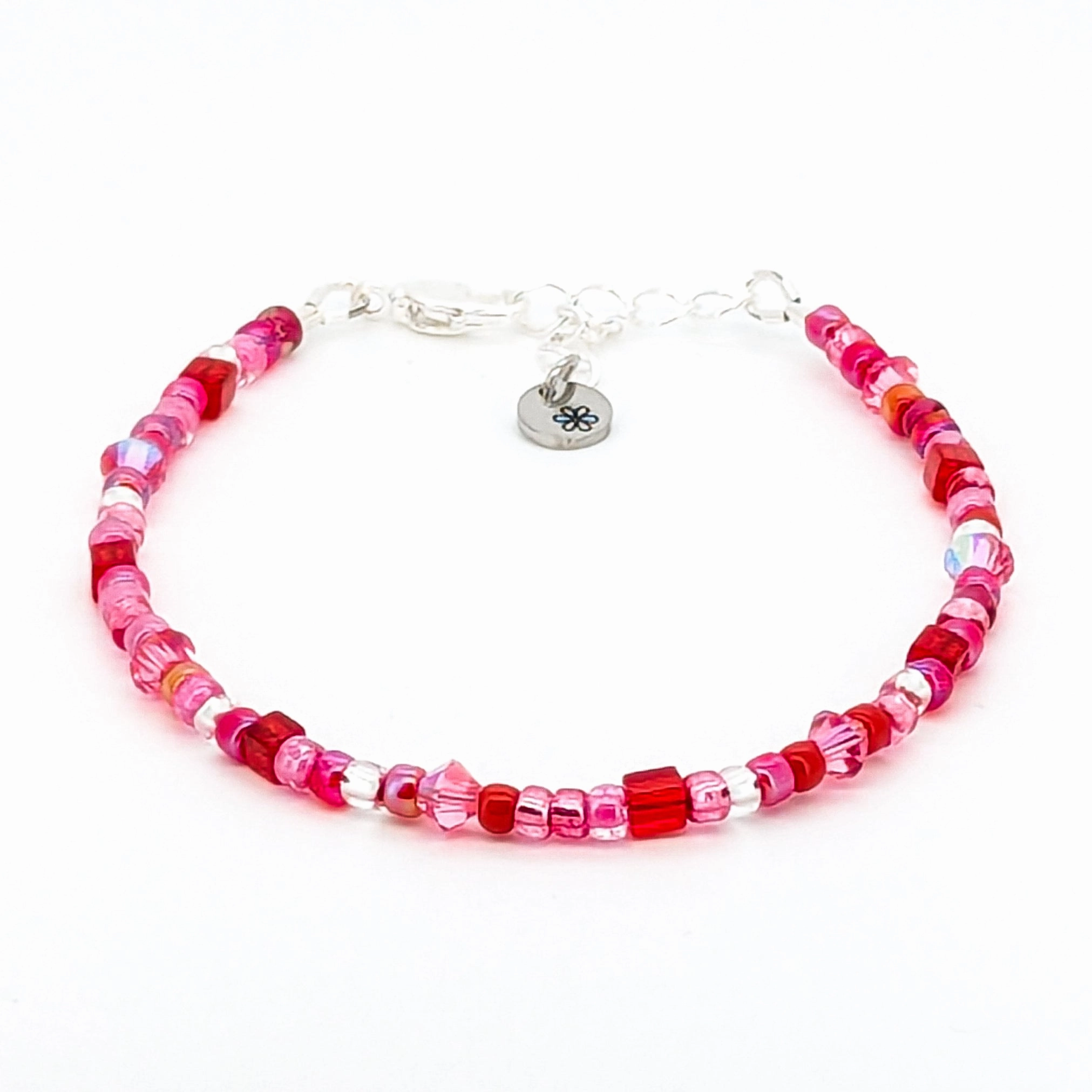 Assorted shaped glass seed beads - Red and Pink bracelet