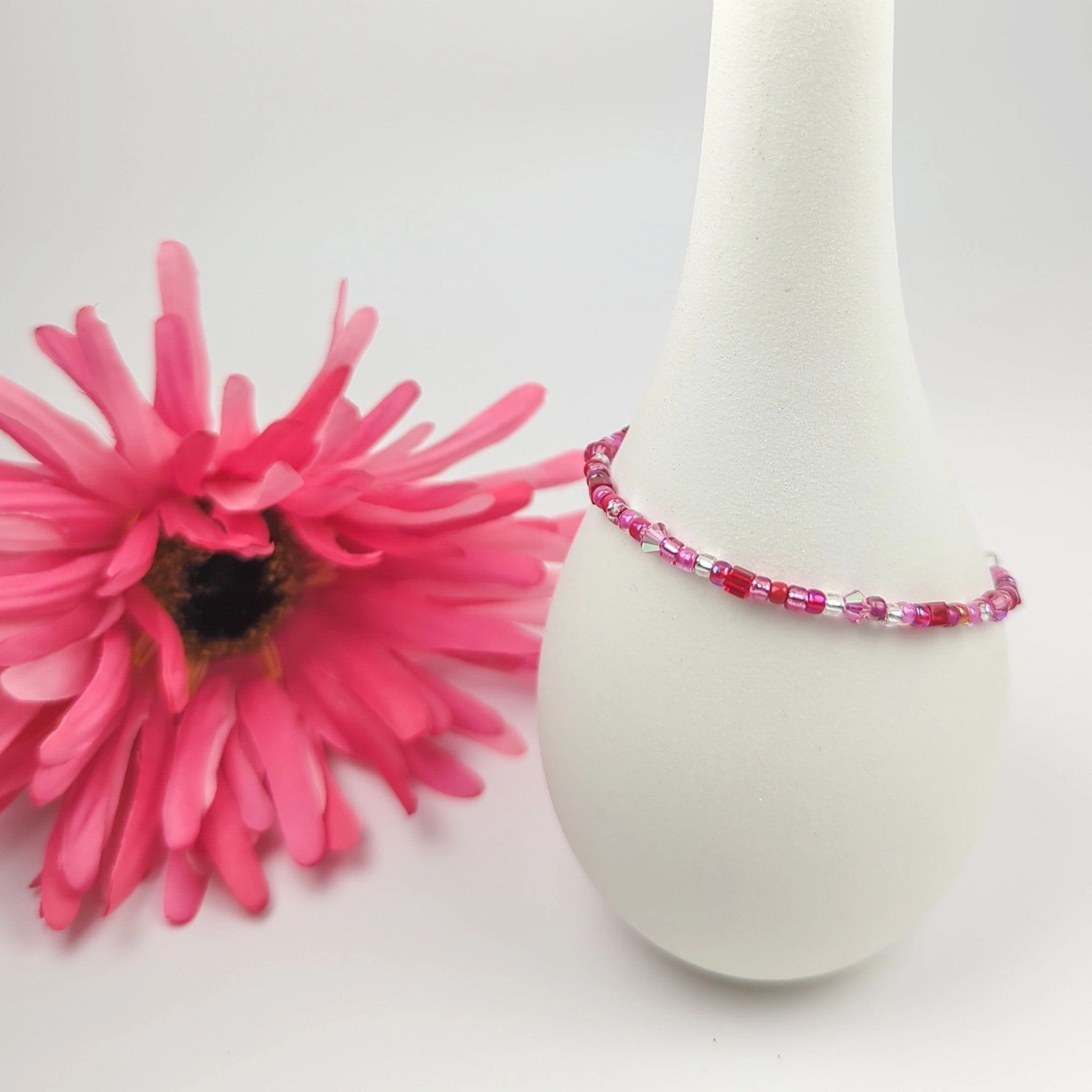 Assorted shaped glass seed beads - Red and Pink bracelet