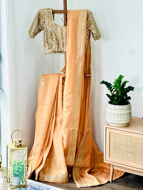 Peach Glossy Soft Tissue  Saree And Blouse