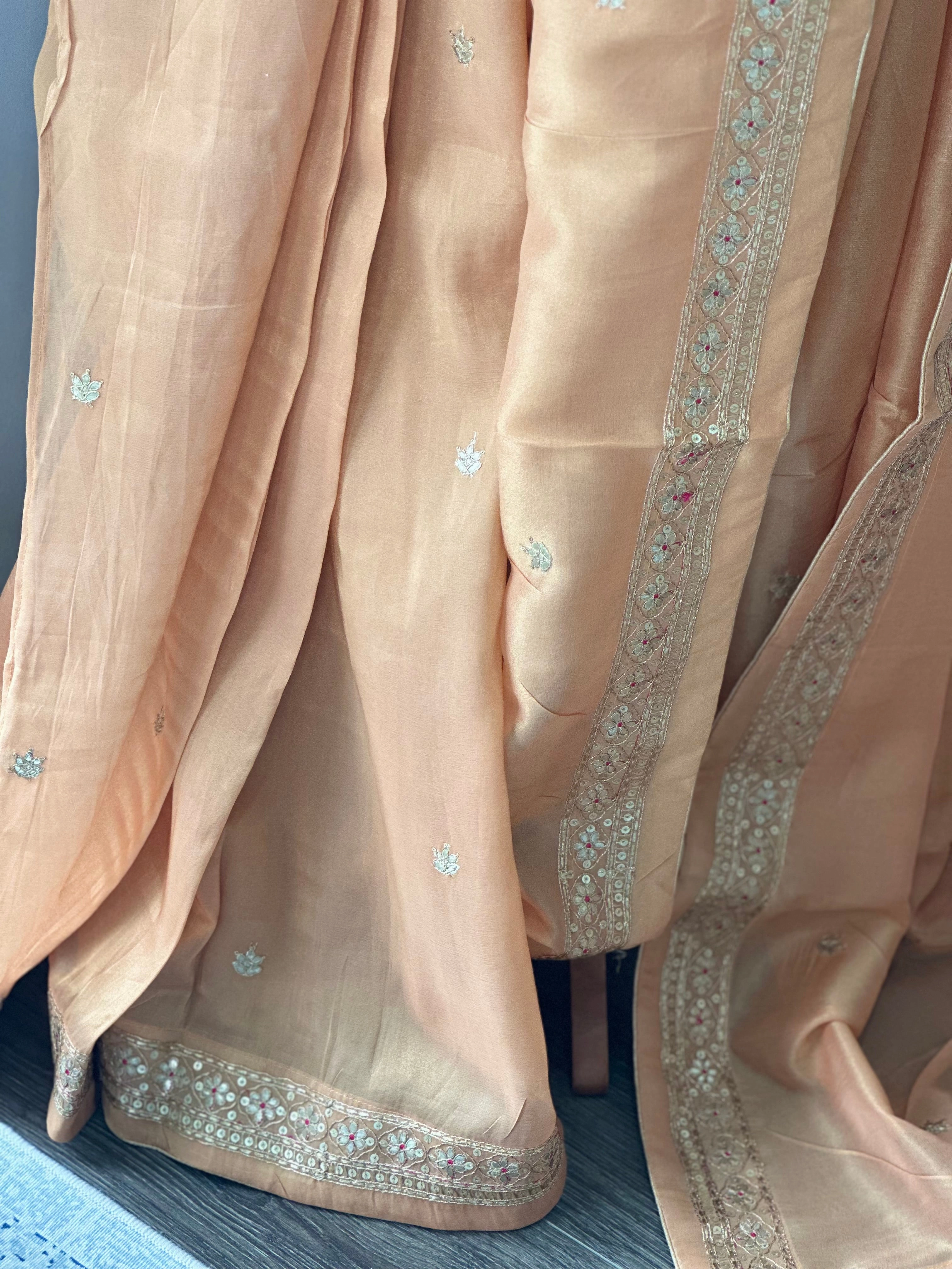 Peach Glossy Soft Tissue  Saree And Blouse