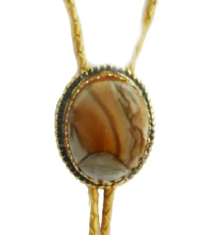 Picture Jasper Cabochon in a Gold Tone and Black Bolo Slide with Gold Lether Cord and Gold Tone Swirl Tips